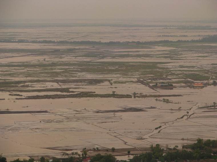 Sunset over a wide stretch of the Mekong Delta